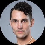 White/Queer Masc Person Pronouns: he/him/they/them Shorter brown hair Brown eyes Facial and ear piercings